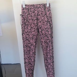 Anahi full length medium compression legging in deep green and pink floral print